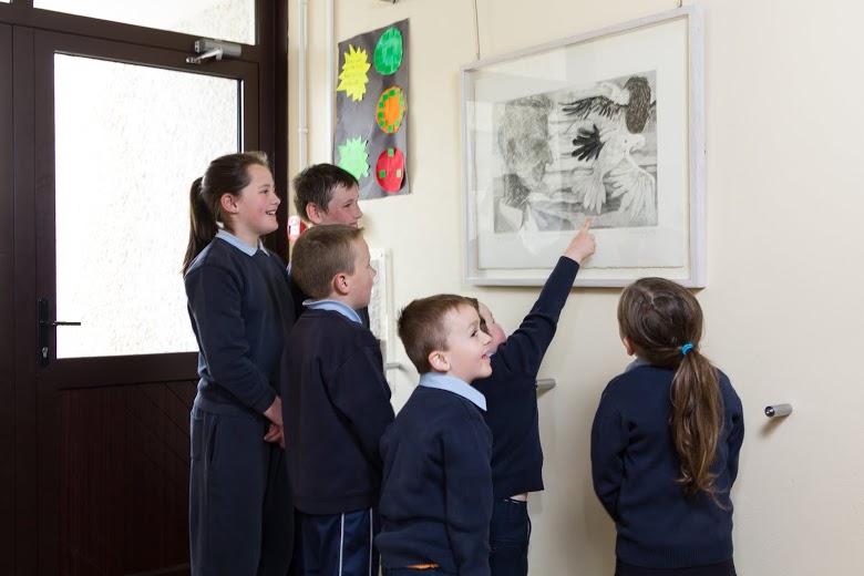Children view the artwork